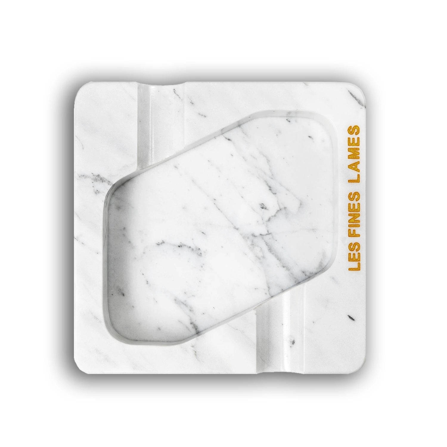 A square white marble-patterned cigarette case with a central cutout, featuring the text 'LES FINES LAMES' printed on the right side, set against a plain white background.