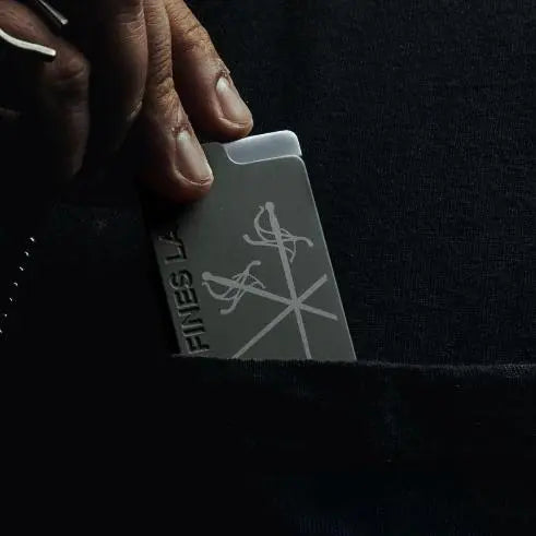 Le FEU BRICK ODG premium cigar lighter slipping into a jacket pocket