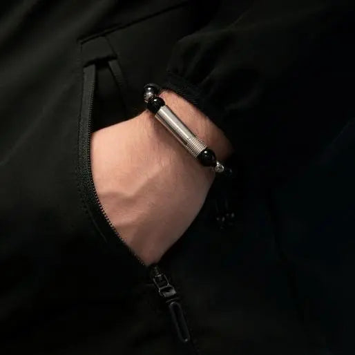 Volcano Skull Punch Bracelet worn on the wrist with hand in pocket
