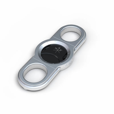 La Guillotine Rotor by LES FINES LAMES, a chrome stainless steel guillotine cigar cutter shown from above