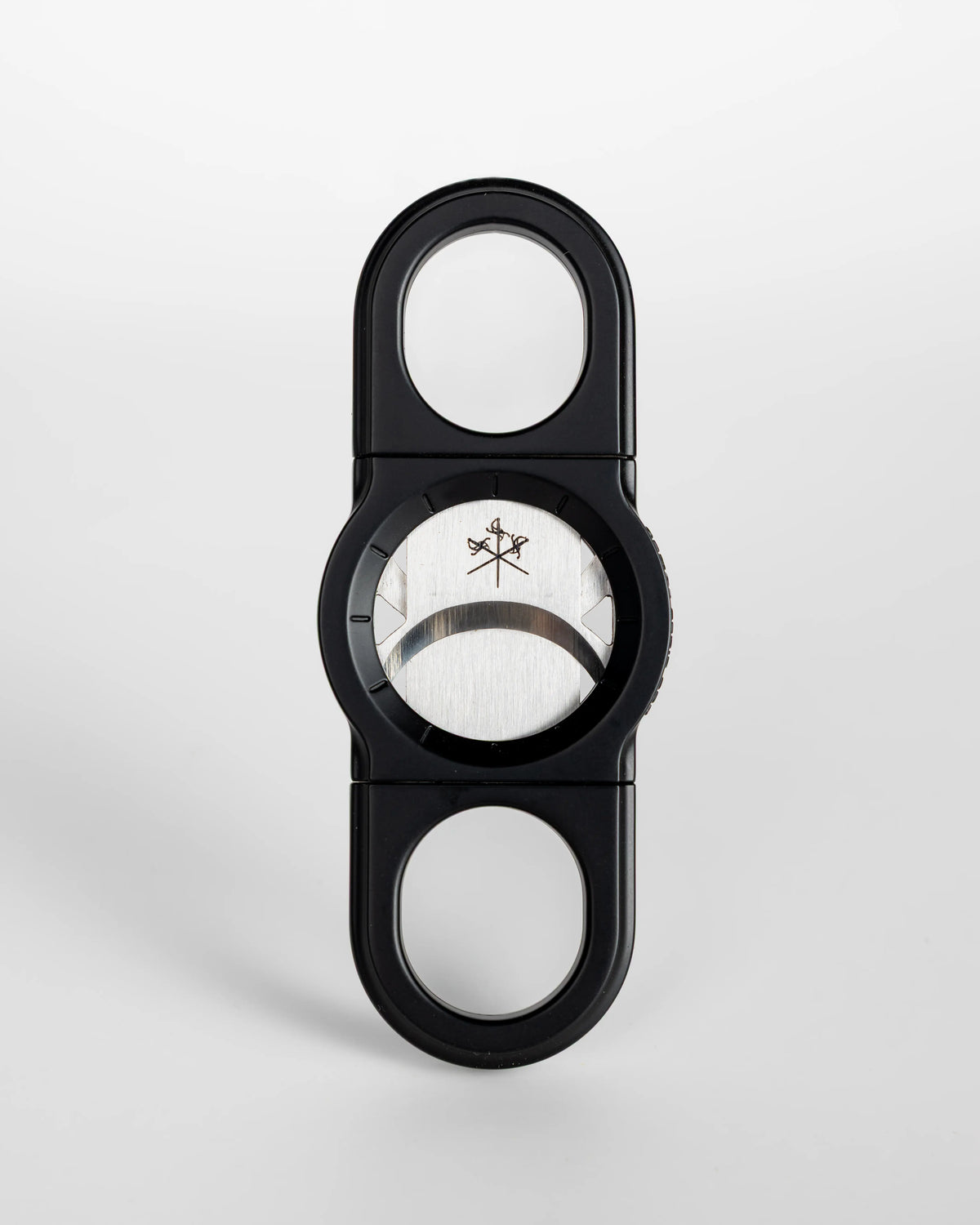 La Guillotine Rotor by LES FINES LAMES, a black stainless steel guillotine cigar cutter shown from the front
