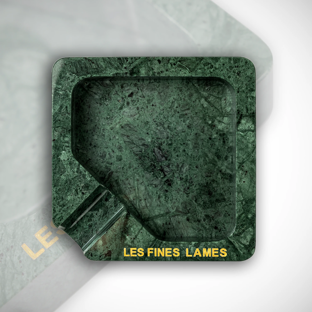A square green marble ashtray