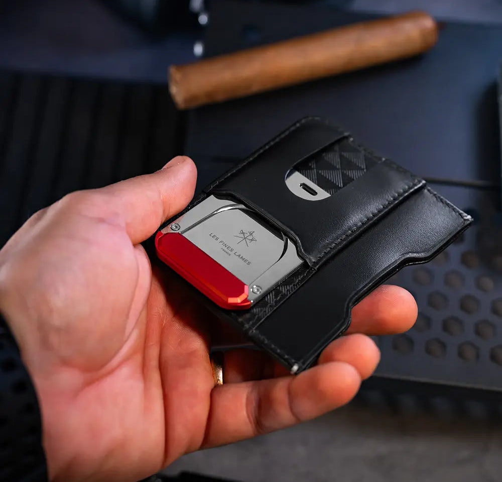 le tag holder red with a cigar